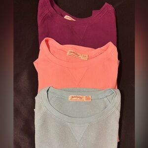 3 Thermal long sleeve tops
Purple, pink/coral, glitter mint blue
Size Medium